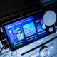 A photo of the Spotify Car Thing mounted in a car's air vent